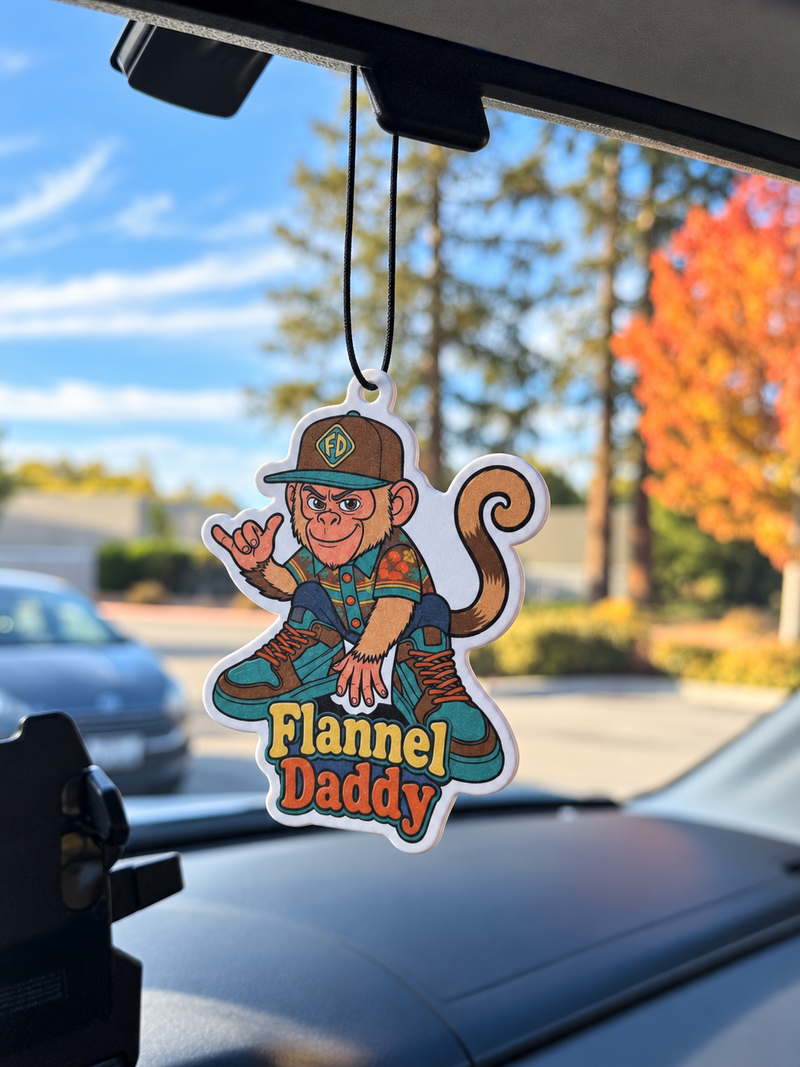 Flannel Daddy Tino car air freshener hanging inside a vehicle
