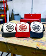Clutch & Throttle black white red white navy white trucker hats