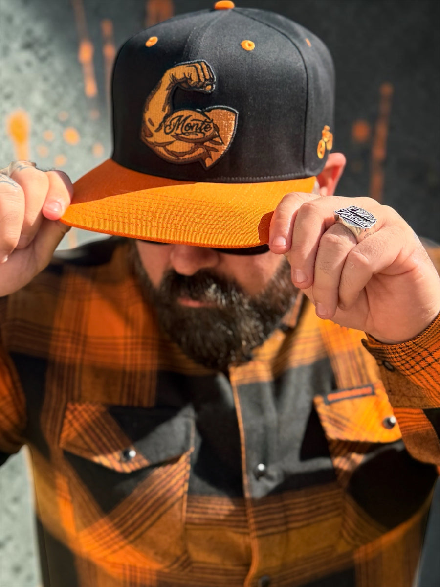 Monte Strong black and orange snapback hat original product photo