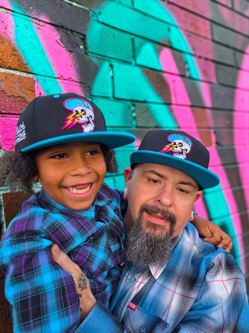 Youth Electrik Bonehead Snapback by Clutch & Throttle — side view
