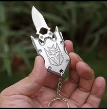 Decepti-Tool mini keychain utility knife — folded view