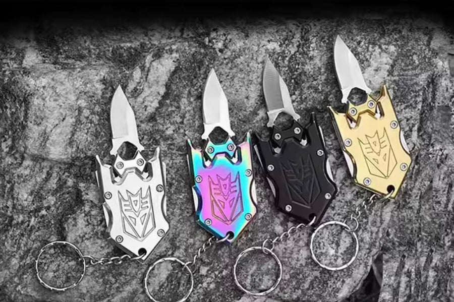 Decepti-Tool mini keychain utility knife by Flannel Daddy Loot