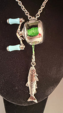 Reel Attraction functional baitcaster necklace with green line and working crank