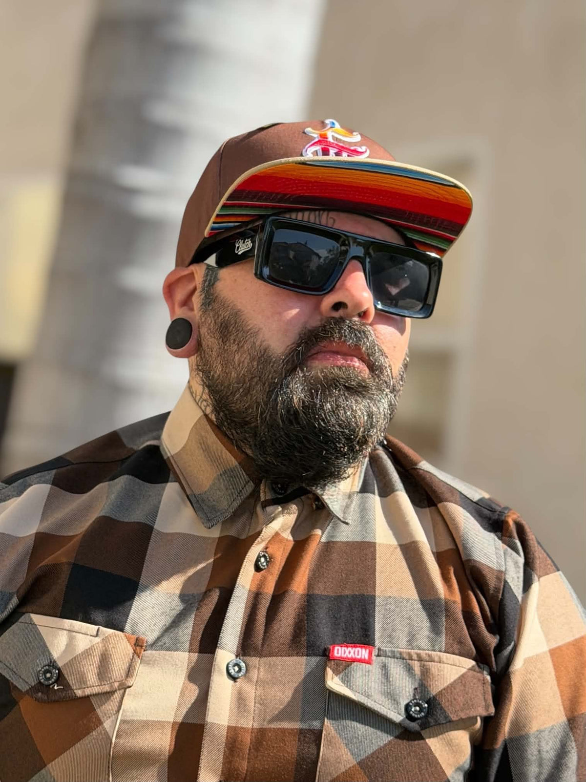Side profile of G’d Up Low Rider Snapback showing serape underbrim