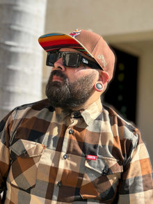 G’d Up Low Rider Snapback worn with colorful serape underbrim visible