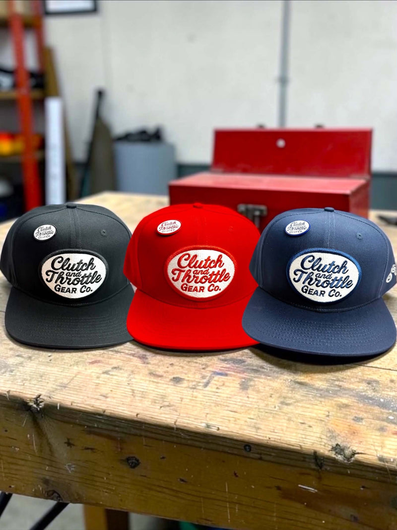 Clutch & Throttle black red and navy solid-color flat-brim snapback hats