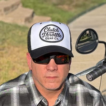 Black and white Clutch & Throttle trucker on model