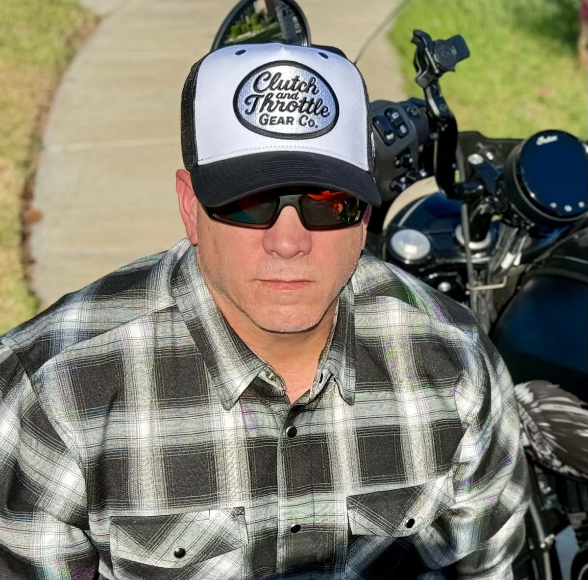 Black and white trucker paired with flannel