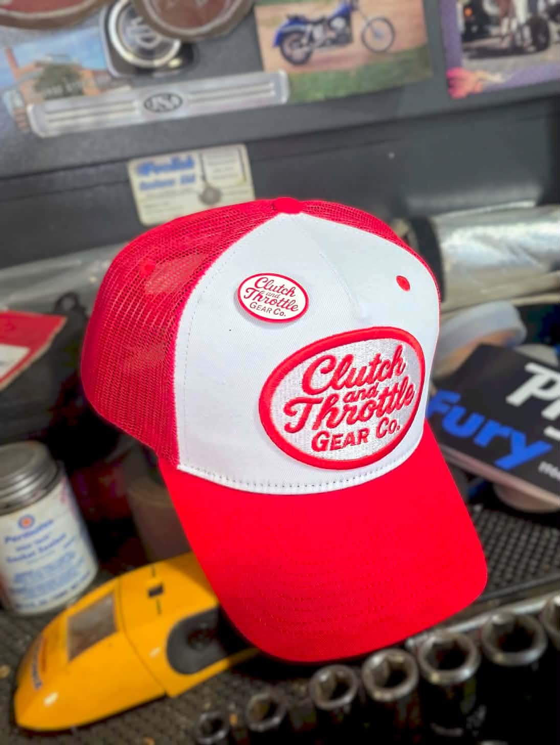 Red and white trucker in auto shop
