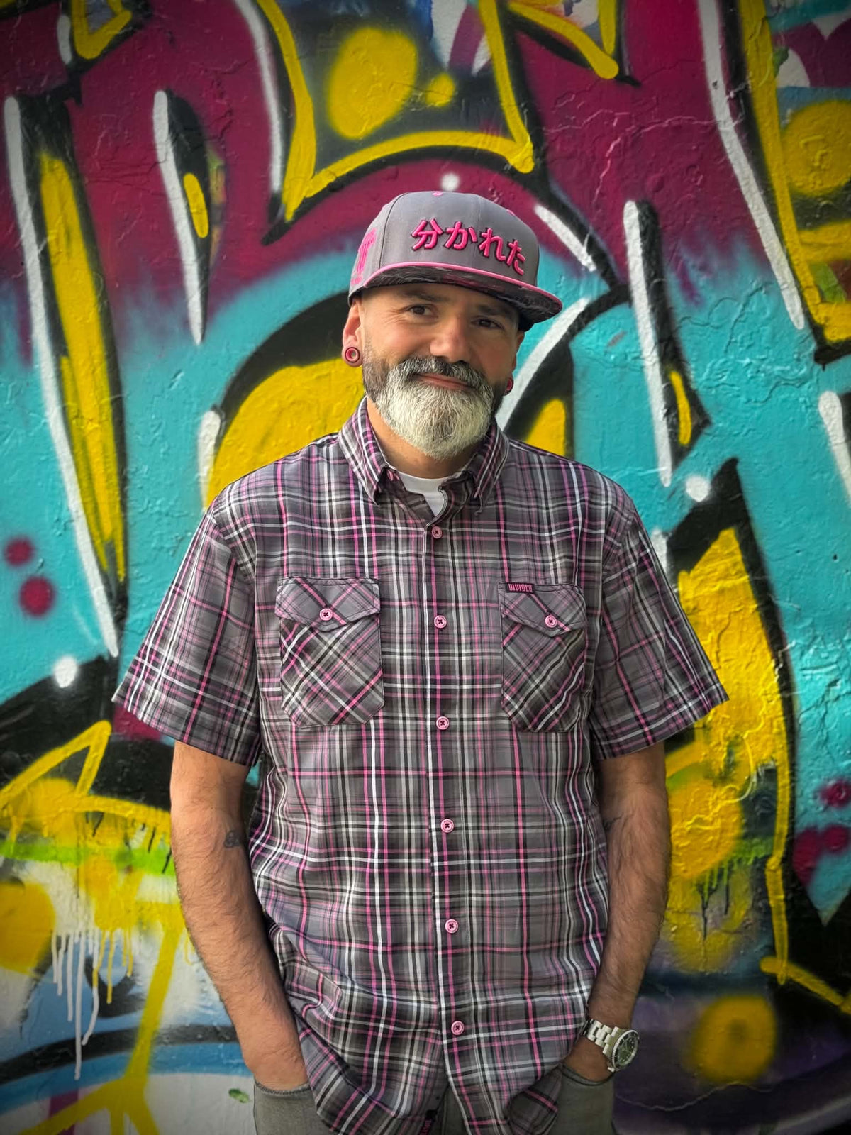 Divided Flannel Co. Seppuku snapback gray crown with pink brim model photo