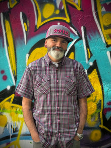 Divided Flannel Co. Seppuku snapback gray crown with pink brim model photo