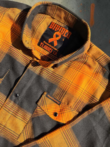 Monte Strong orange and charcoal plaid flannel original product photo