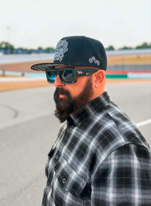 Side view of Clutch & Throttle Speed Racer Snapback with black and white checkered brim